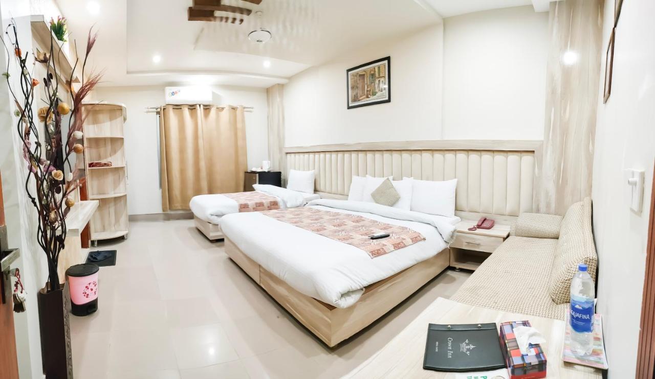 Hotel Crown Inn Multan Bagian luar foto